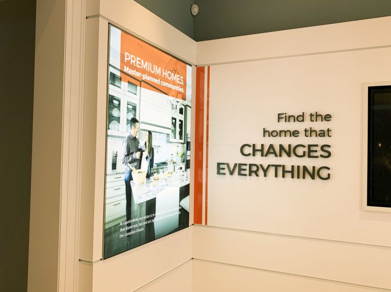 Wall-mounted LED lightbox featuring building floorplans